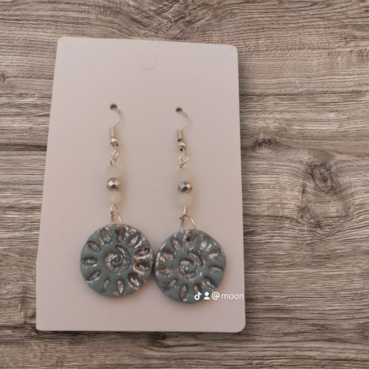 Pendientes arcilla y cristal